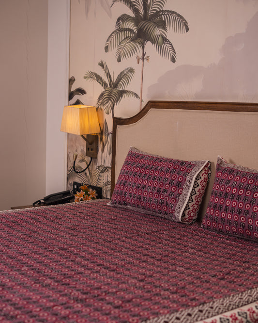 Close-up of Berry Courtyard Jaipur Block Print showcasing intricate floral detailing.