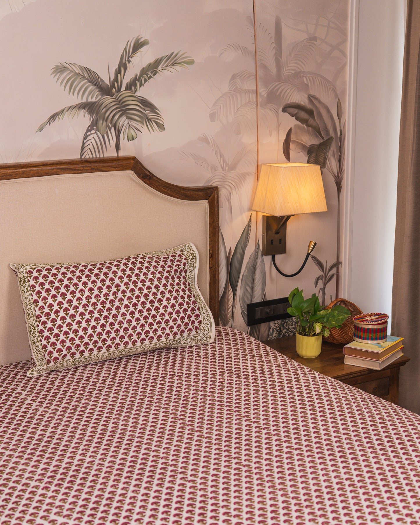 Wildflower Hall Jaipur Block Print Cotton Bedsheet styled in a warm and inviting bedroom setting.