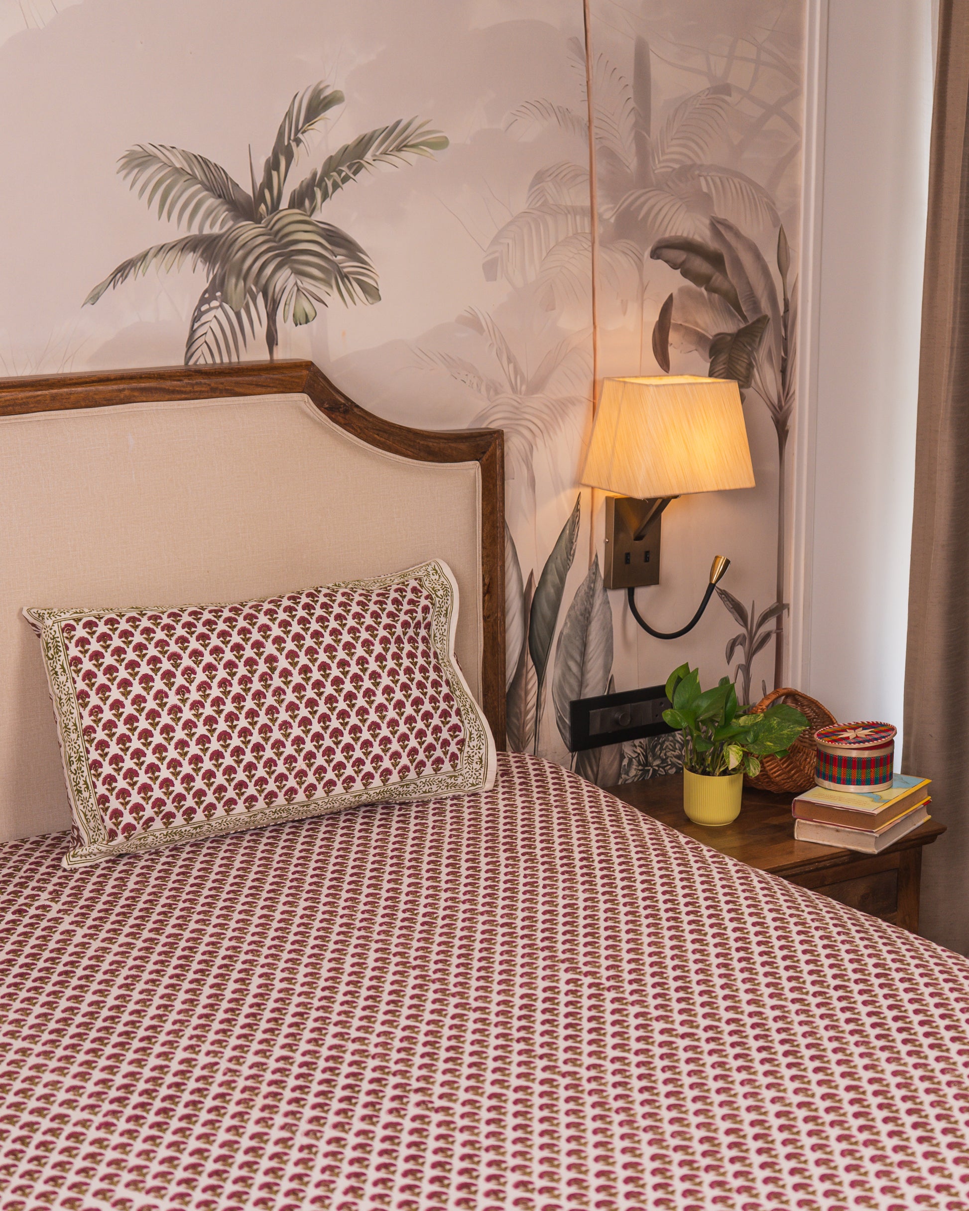 Wildflower Hall Jaipur Block Print Cotton Bedsheet styled in a warm and inviting bedroom setting.