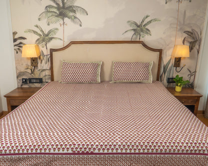 Wildflower Hall Jaipur Block Print Cotton Bedsheet featuring scattered floral motifs in warm earthy tones.
