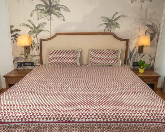 Wildflower Hall Jaipur Block Print Cotton Bedsheet featuring scattered floral motifs in warm earthy tones.