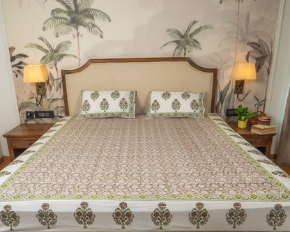 Olive Grove Jaipur Block Print Cotton Bedsheet featuring muted olive floral motifs on a soft neutral base.