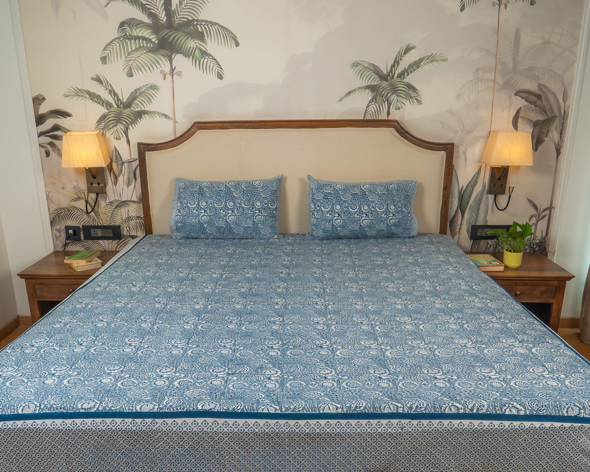 Poonam Bagh Jaipur Block Print Cotton Bedsheet featuring soft blue-grey floral motifs on a light base.