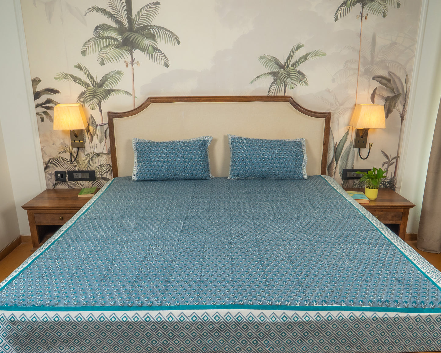 Teal Pavilion Jaipur Block Print Cotton Bedsheet featuring elegant teal motifs on a light base.