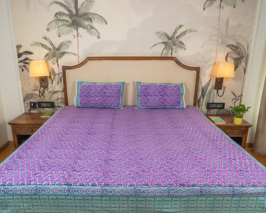 Lilac Bloom Jaipur Block Print Cotton Bedsheet featuring delicate lilac floral motifs on an ivory base.