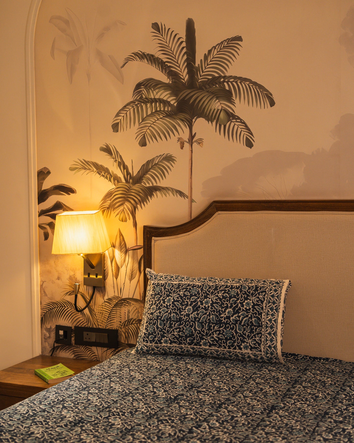 Indigo Manor Jaipur Block Print Cotton Bedsheet styled in an elegant bedroom with classic blue accents.