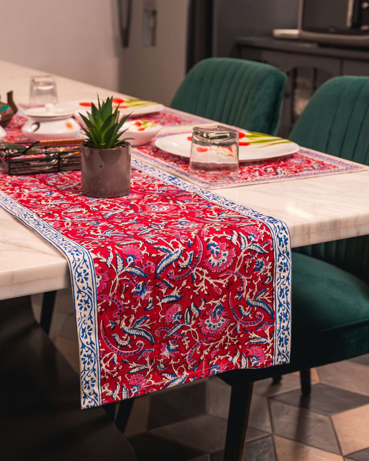 Rani Bagh Jaipur Block Print Cotton Table Runner styled on an elegant dining table with warm décor accents.