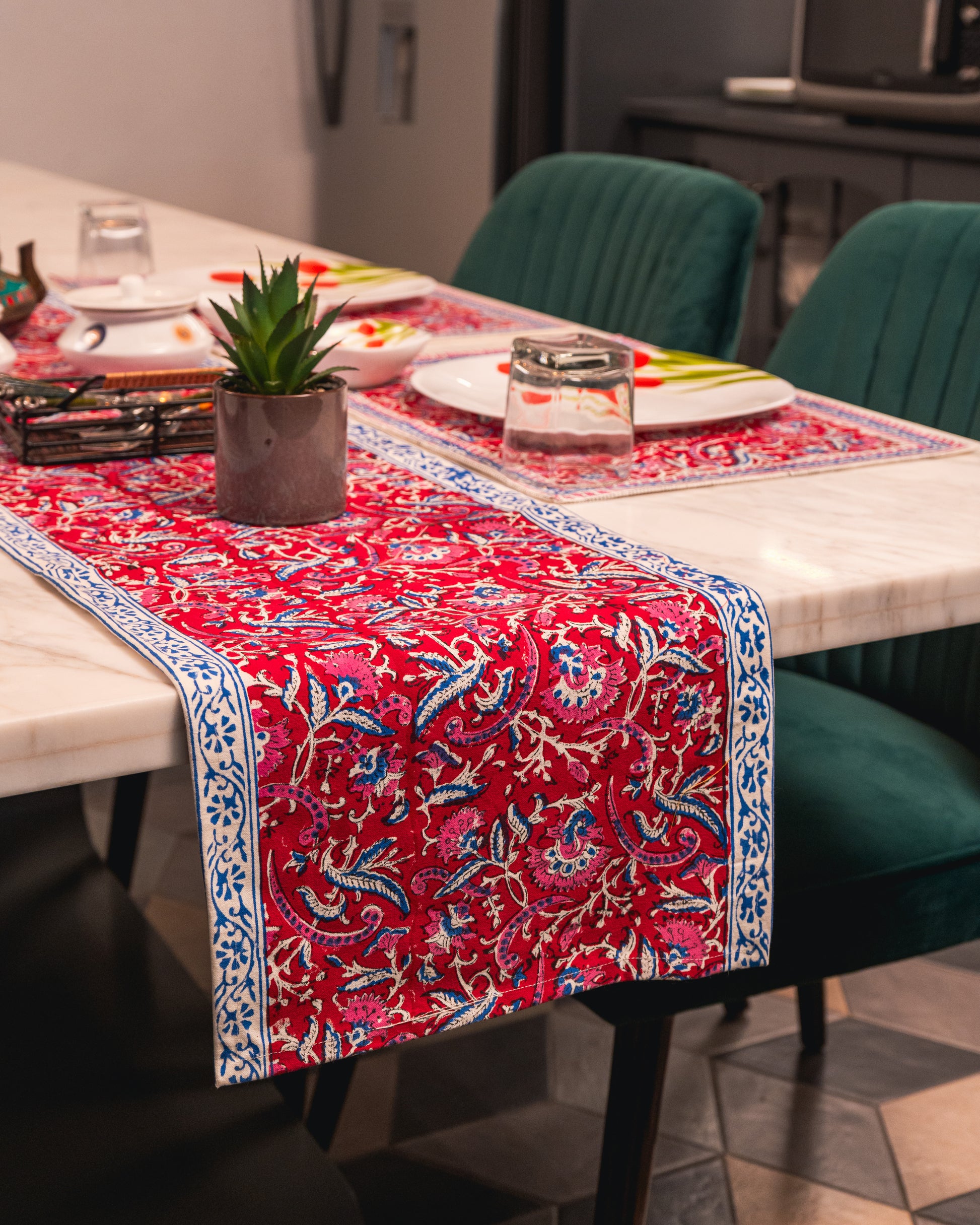 Rani Bagh Jaipur Block Print Cotton Table Runner styled on an elegant dining table with warm décor accents.