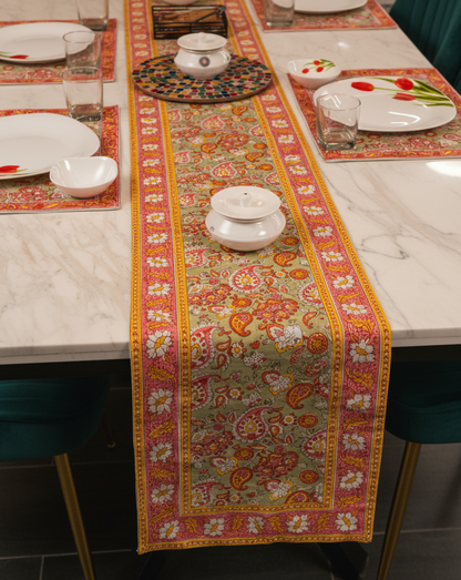 Rang Chowk Jaipur Block Print Cotton Table Runner styled on a dining table with warm and colourful décor accents.