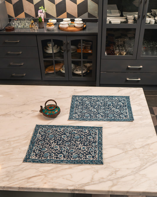Indigo Manor Jaipur Block Print Cotton Placemats Set of 2 featuring intricate indigo floral motifs on a light base.